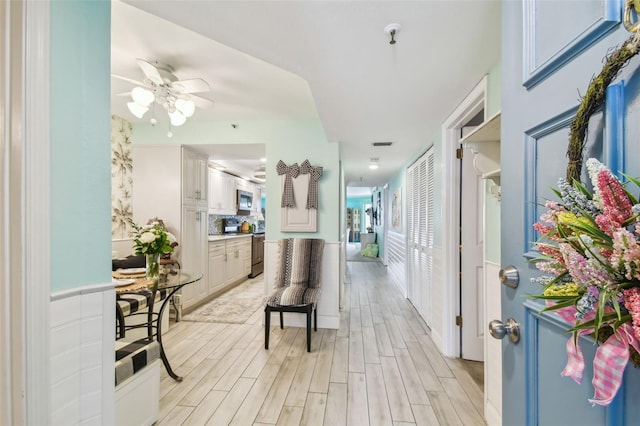 17980 Gulf Blvd Unit 505, Redington Shores, FL 33708 - corridor with light wood finished floors