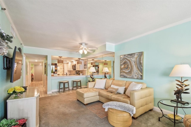 17980 Gulf Blvd Unit 505, Redington Shores, FL 33708 - living area featuring crown molding, ceiling fan, light colored carpet, and baseboards