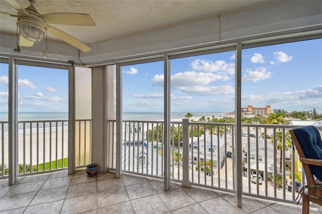 17980 Gulf Blvd Unit 505, Redington Shores, FL 33708 - unfurnished sunroom featuring a water view