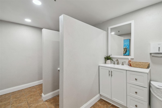 17980 Gulf Blvd Unit 505, Redington Shores, FL 33708 - bathroom with vanity, baseboards, tile patterned floors, and recessed lighting