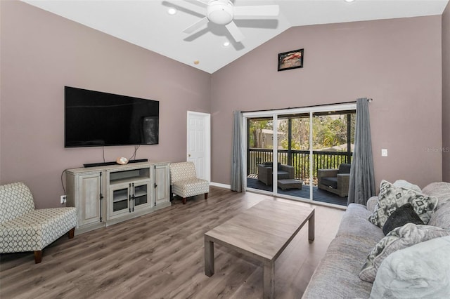 6521 Oelsner St, New Port Richey, FL 34652 - living area with ceiling fan, wood finished floors, high vaulted ceiling, recessed lighting, and baseboards