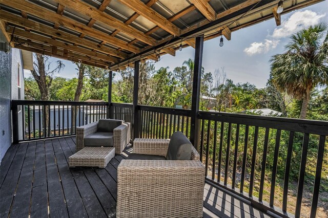 6521 Oelsner St, New Port Richey, FL 34652 - deck featuring view of wooded area