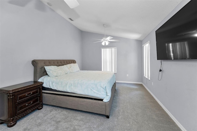 6521 Oelsner St, New Port Richey, FL 34652 - carpeted bedroom featuring vaulted ceiling, a ceiling fan, and baseboards