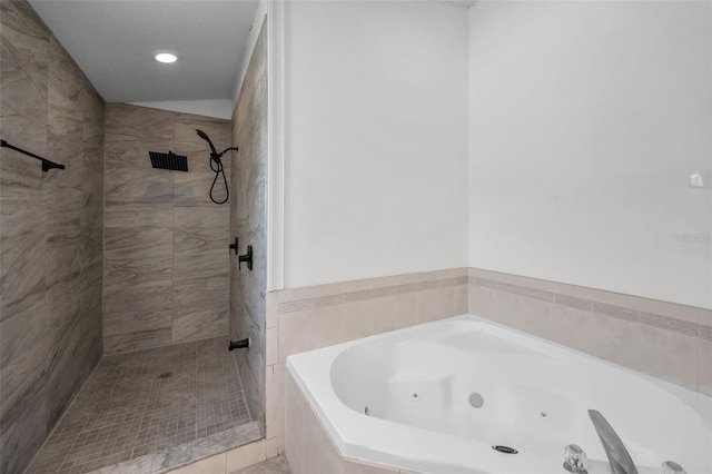 6521 Oelsner St, New Port Richey, FL 34652 - full bathroom featuring a shower stall, a jetted tub, and recessed lighting
