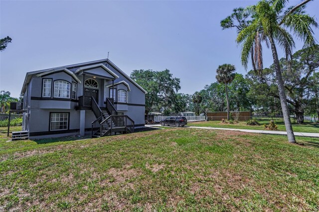 6521 Oelsner St, New Port Richey, FL 34652 - view of front of house with stucco siding