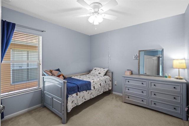 25332 Lexington Oaks Blvd, Wesley Chapel, FL 33544 - bedroom featuring light carpet, baseboards, and ceiling fan