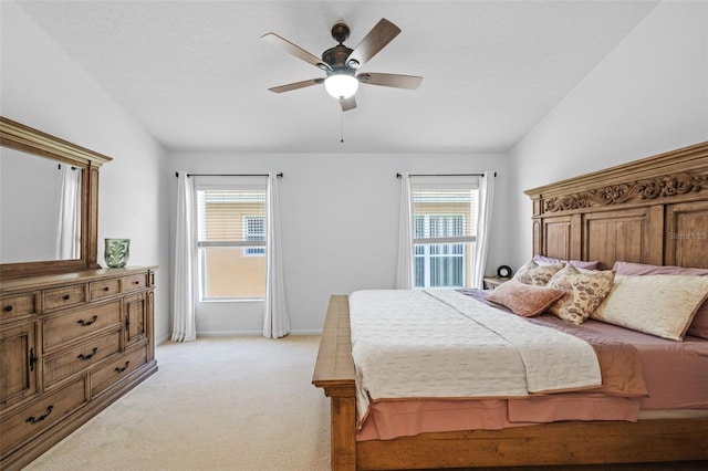 25332 Lexington Oaks Blvd, Wesley Chapel, FL 33544 - bedroom with multiple windows, light colored carpet, baseboards, and ceiling fan
