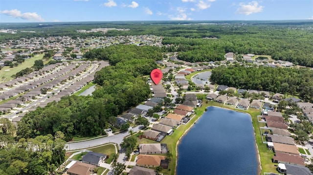 25332 Lexington Oaks Blvd, Wesley Chapel, FL 33544 - aerial view of property's location with nearby suburban area, a nearby body of water, and a heavily wooded area