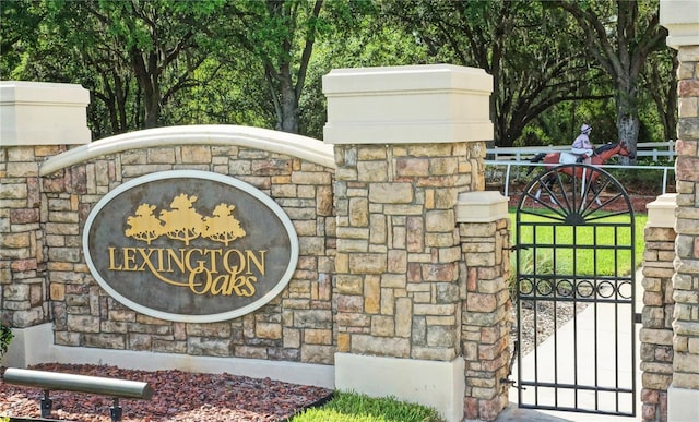 25332 Lexington Oaks Blvd, Wesley Chapel, FL 33544 - community / neighborhood sign featuring a gate