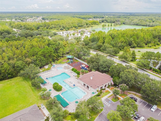 25332 Lexington Oaks Blvd, Wesley Chapel, FL 33544 - aerial view of a nearby body of water, a pool, and a heavily wooded area