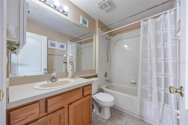 25942 Risen Star Dr, Wesley Chapel, FL 33544 - full bath with shower / tub combo with curtain, tile patterned flooring, vanity, and a textured ceiling