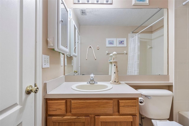 25942 Risen Star Dr, Wesley Chapel, FL 33544 - bathroom featuring vanity, a shower with shower curtain, and a textured ceiling