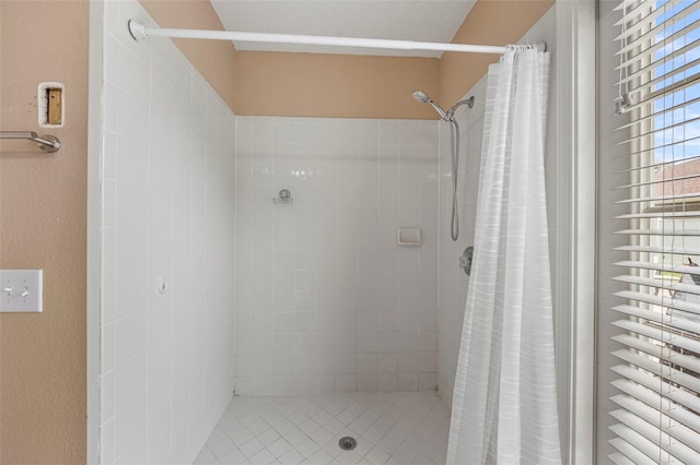 25942 Risen Star Dr, Wesley Chapel, FL 33544 - full bath featuring tiled shower and tile patterned flooring