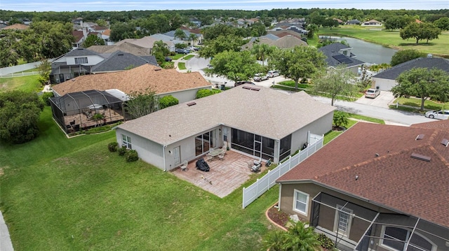 25942 Risen Star Dr, Wesley Chapel, FL 33544 - aerial view of residential area featuring a nearby body of water