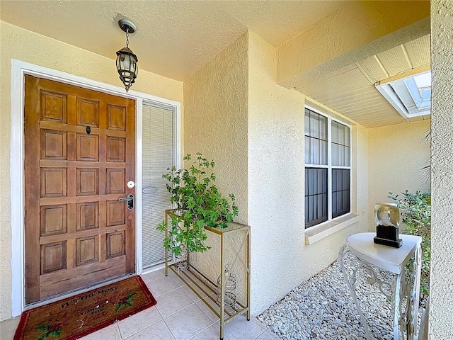 1599 Mcauliffe Ln, Palm Harbor, FL 34683 - view of exterior entry with stucco siding