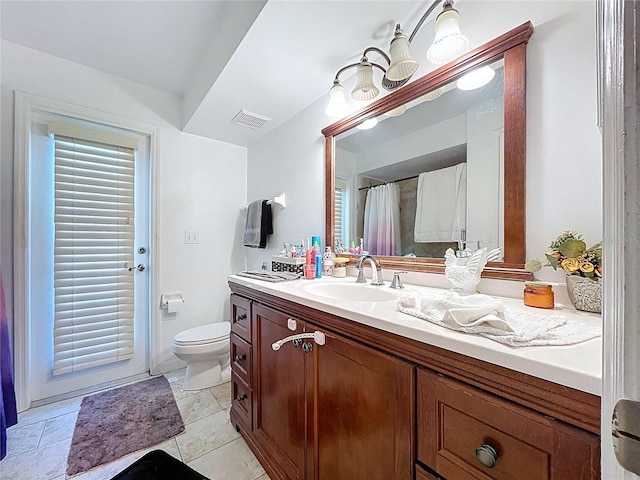 1599 Mcauliffe Ln, Palm Harbor, FL 34683 - bathroom featuring vanity, toilet, and a shower with curtain