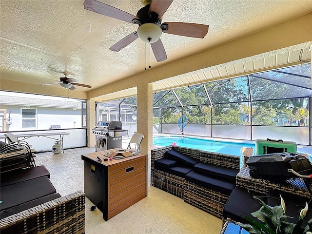 1599 Mcauliffe Ln, Palm Harbor, FL 34683 - view of patio / terrace featuring a ceiling fan, glass enclosure, an outdoor pool, and grilling area