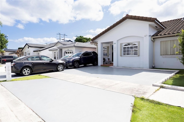 2901 SW 136th Ct, Miami, FL 33175 - view of front of house with stucco siding and a tiled roof
