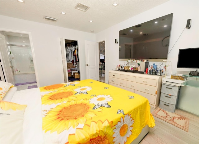 2901 SW 136th Ct, Miami, FL 33175 - bedroom with a closet, ensuite bathroom, light wood finished floors, recessed lighting, and a walk in closet
