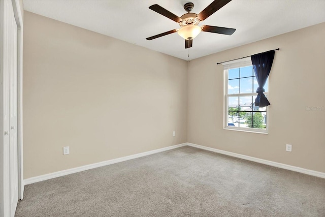 5067 Sable Chime Dr, Wimauma, FL 33598 - unfurnished room with carpet floors, baseboards, and ceiling fan