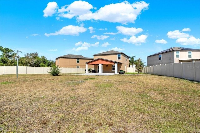 5067 Sable Chime Dr, Wimauma, FL 33598 - rear view of house with a patio