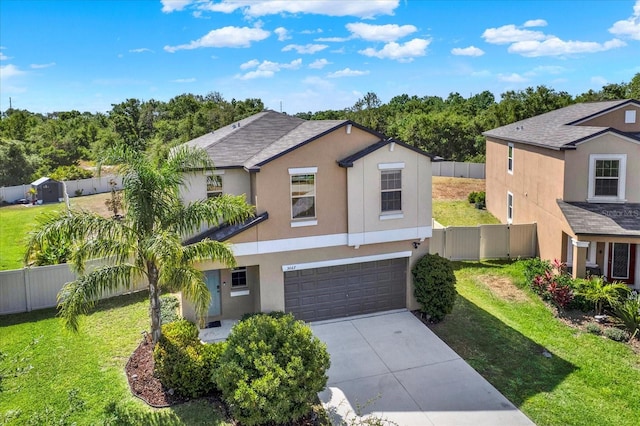 5067 Sable Chime Dr, Wimauma, FL 33598 - view of front facade with a garage, stucco siding, and driveway