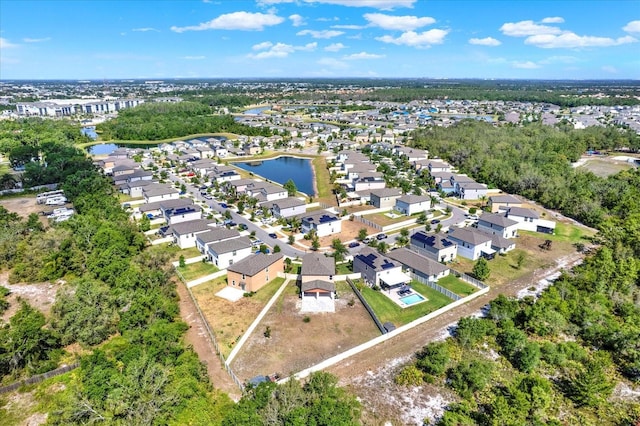 5067 Sable Chime Dr, Wimauma, FL 33598 - aerial perspective of suburban area with a nearby body of water