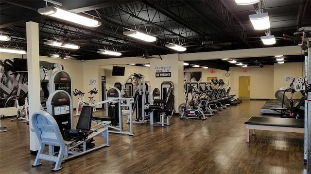 gym featuring wood finished floors