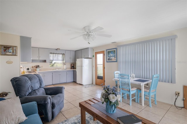 2220 S Coon Pt, Crystal River, FL 34429 - living room featuring light tile patterned flooring and a ceiling fan