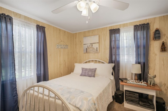2220 S Coon Pt, Crystal River, FL 34429 - bedroom featuring wood walls and a ceiling fan
