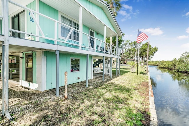 2220 S Coon Pt, Crystal River, FL 34429 - view of property exterior featuring a deck with water view