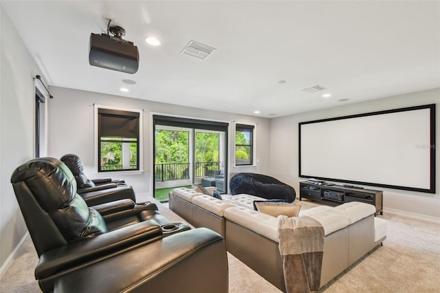 cinema with carpet, baseboards, healthy amount of natural light, and recessed lighting