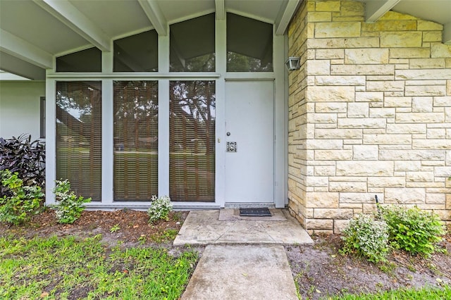 1675 Robin Hood Ln, Clearwater, FL 33764 - entrance to property featuring stone siding