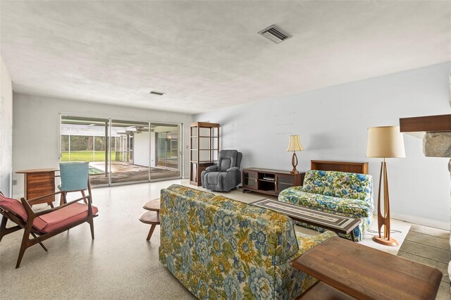 1675 Robin Hood Ln, Clearwater, FL 33764 - living room featuring speckle patterned floor
