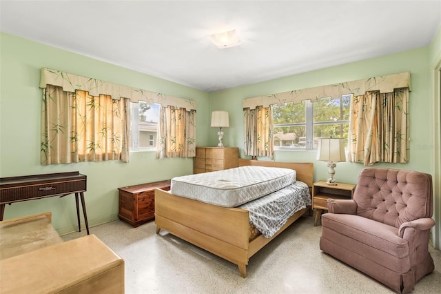 1675 Robin Hood Ln, Clearwater, FL 33764 - bedroom with speckle patterned floor