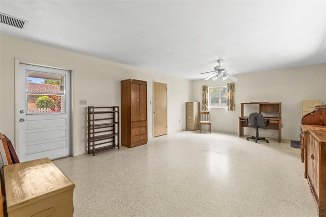 1675 Robin Hood Ln, Clearwater, FL 33764 - sitting room featuring speckle patterned floor and ceiling fan