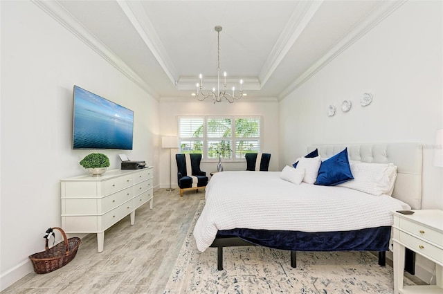 15525 Corona Del Mar Dr, Wimauma, FL 33598 - bedroom with wood finished floors, crown molding, a chandelier, a tray ceiling, and baseboards