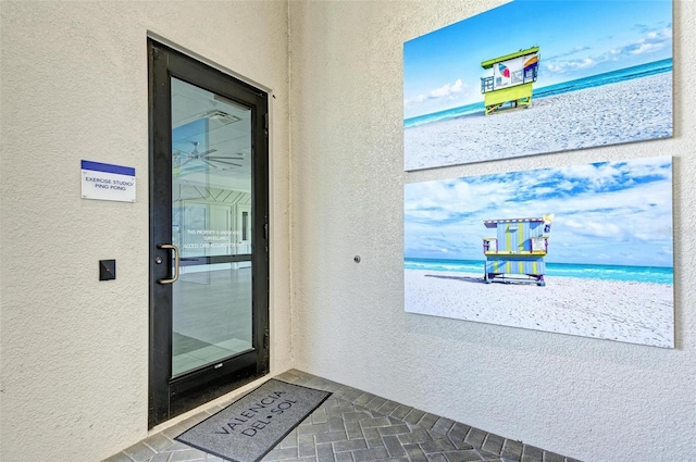 15525 Corona Del Mar Dr, Wimauma, FL 33598 - entryway with a textured wall and a water view