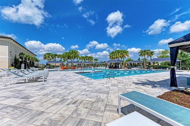 15525 Corona Del Mar Dr, Wimauma, FL 33598 - community pool with a gazebo and a patio