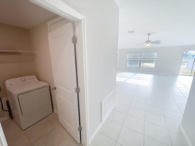 11524 Sage Canyon Dr, Riverview, FL 33578 - washroom featuring washer / clothes dryer, light tile patterned flooring, ceiling fan, and baseboards