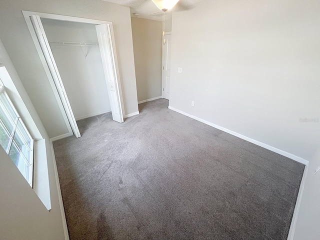 11524 Sage Canyon Dr, Riverview, FL 33578 - unfurnished bedroom featuring carpet flooring, a closet, and baseboards