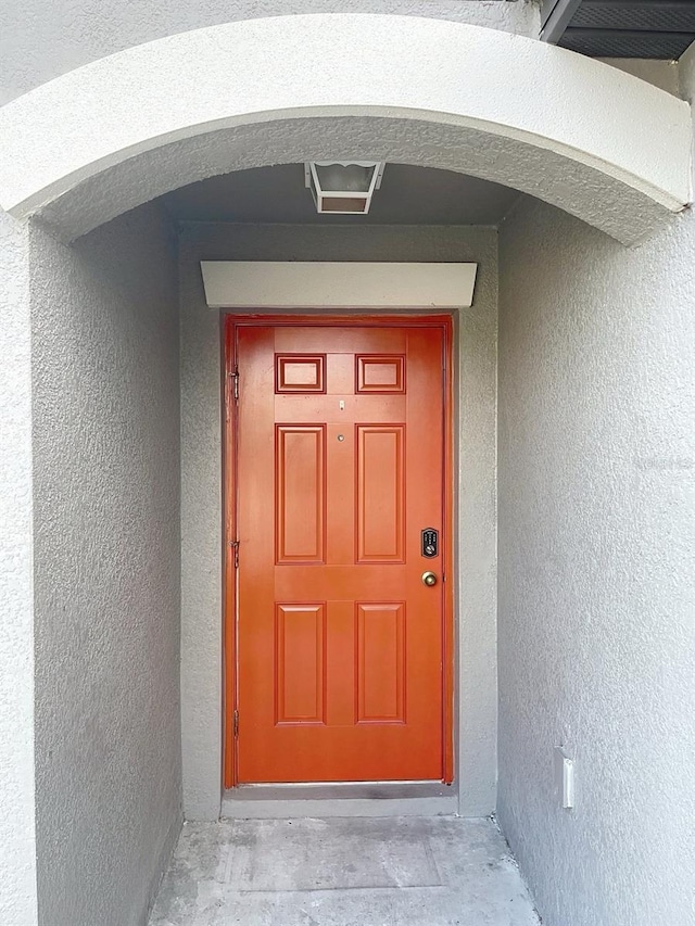 11524 Sage Canyon Dr, Riverview, FL 33578 - doorway to property with stucco siding