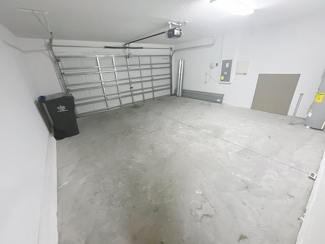 11524 Sage Canyon Dr, Riverview, FL 33578 - garage with a garage door opener and electric panel