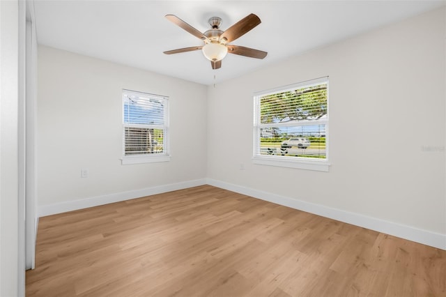 526 62nd Ave NE, Saint Petersburg, FL 33702 - empty room featuring baseboards, light wood-style flooring, and ceiling fan