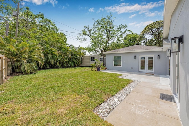 526 62nd Ave NE, Saint Petersburg, FL 33702 - view of yard with french doors