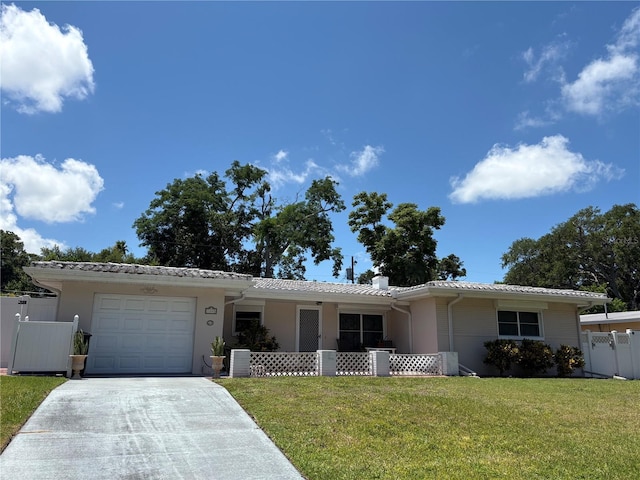 single story home featuring a garage, driveway, a chimney, and stucco siding