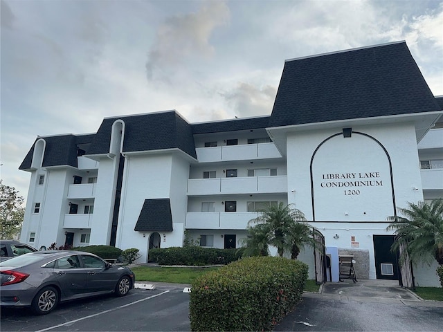 1200 37th St N Unit 403, Saint Petersburg, FL 33713 - view of building exterior featuring uncovered parking