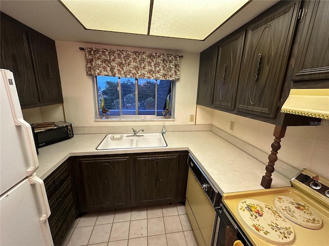 1200 37th St N Unit 403, Saint Petersburg, FL 33713 - kitchen with a sink, freestanding refrigerator, dishwasher, black microwave, and range