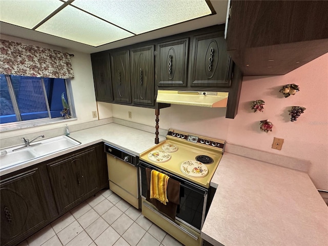 1200 37th St N Unit 403, Saint Petersburg, FL 33713 - kitchen featuring electric range, ventilation hood, a sink, dishwashing machine, and light countertops