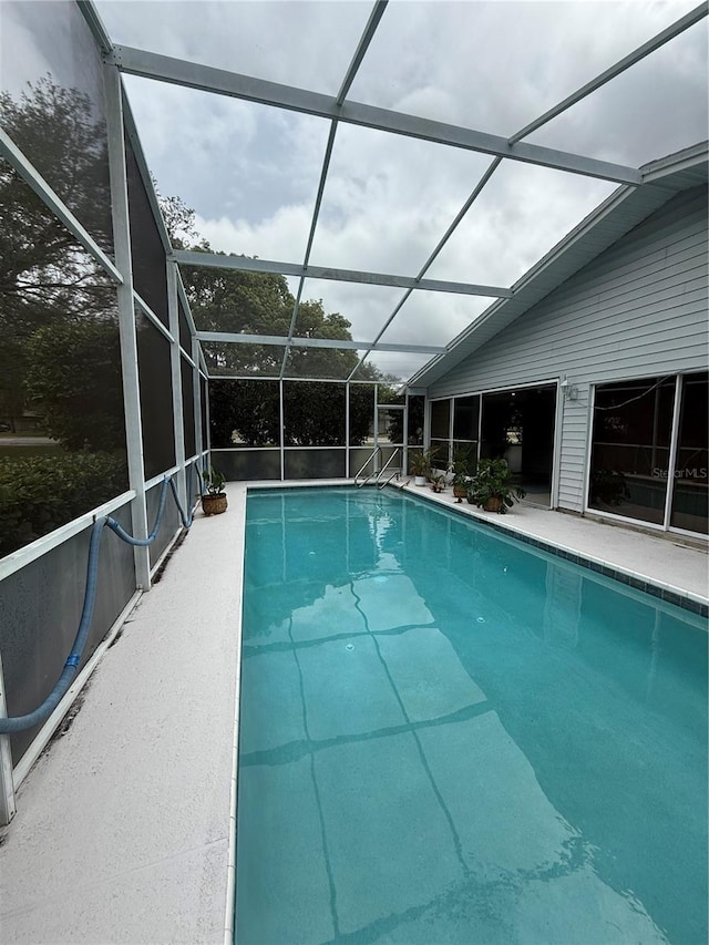outdoor pool with glass enclosure